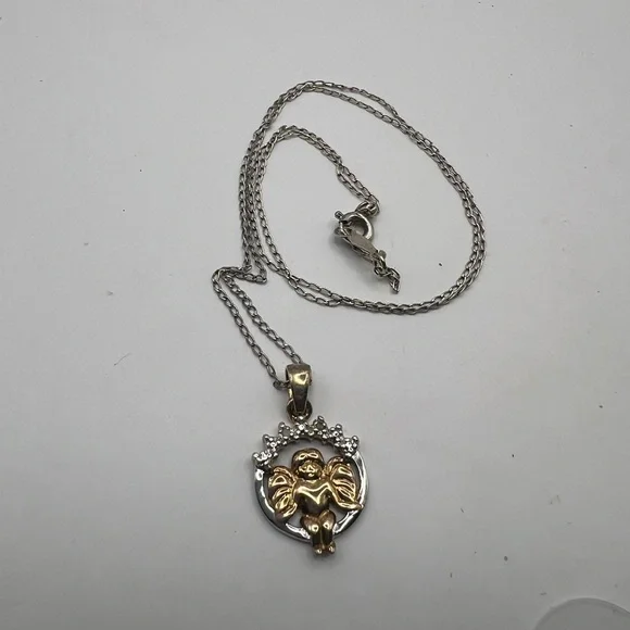 Angel Pendant marked RJ 925 Thailand on a 925 marked sterling chain - Picture 6 of 7